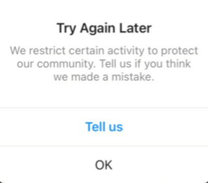 TRY AGAIN LATER - Instagram restriction message. 
